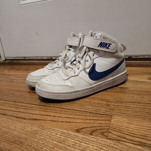 Nike White High-Top Sneakers with Blue Swoosh